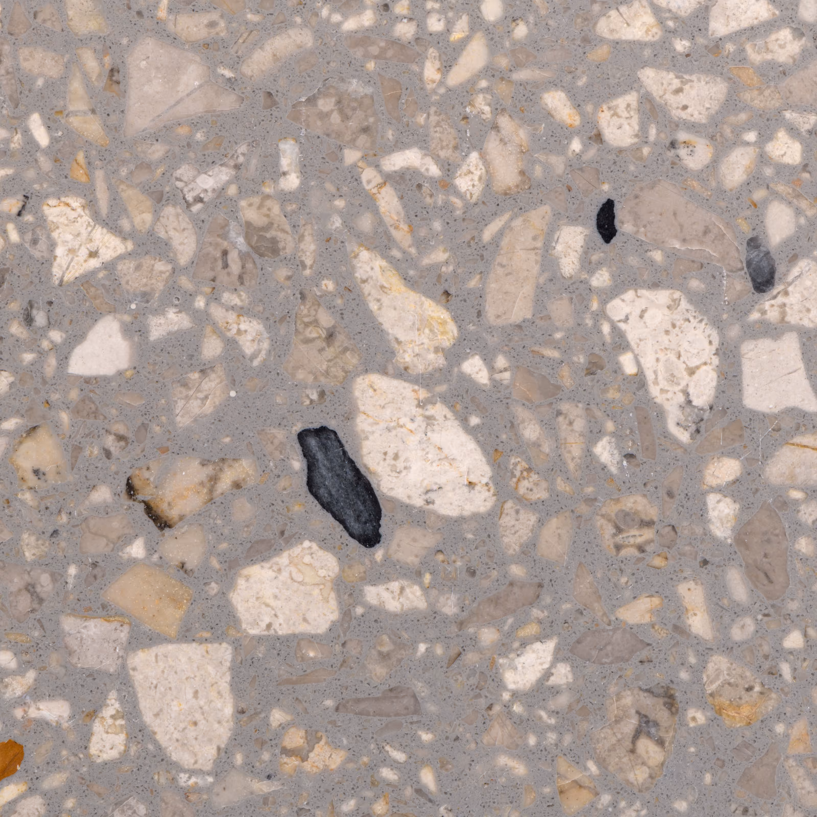 El terrazo de los pisos de Getafe Terrazo de cerca: trozos de mármol y piedra en el cemento